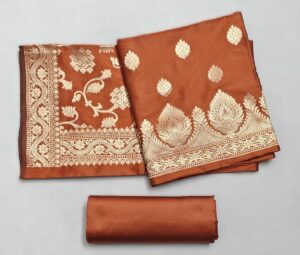 Rust Semi Silk Banarasi suit with Zari work and Jaal Dupatta