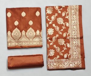 Rust Semi Silk Banarasi suit with Zari work and Jaal Dupatta